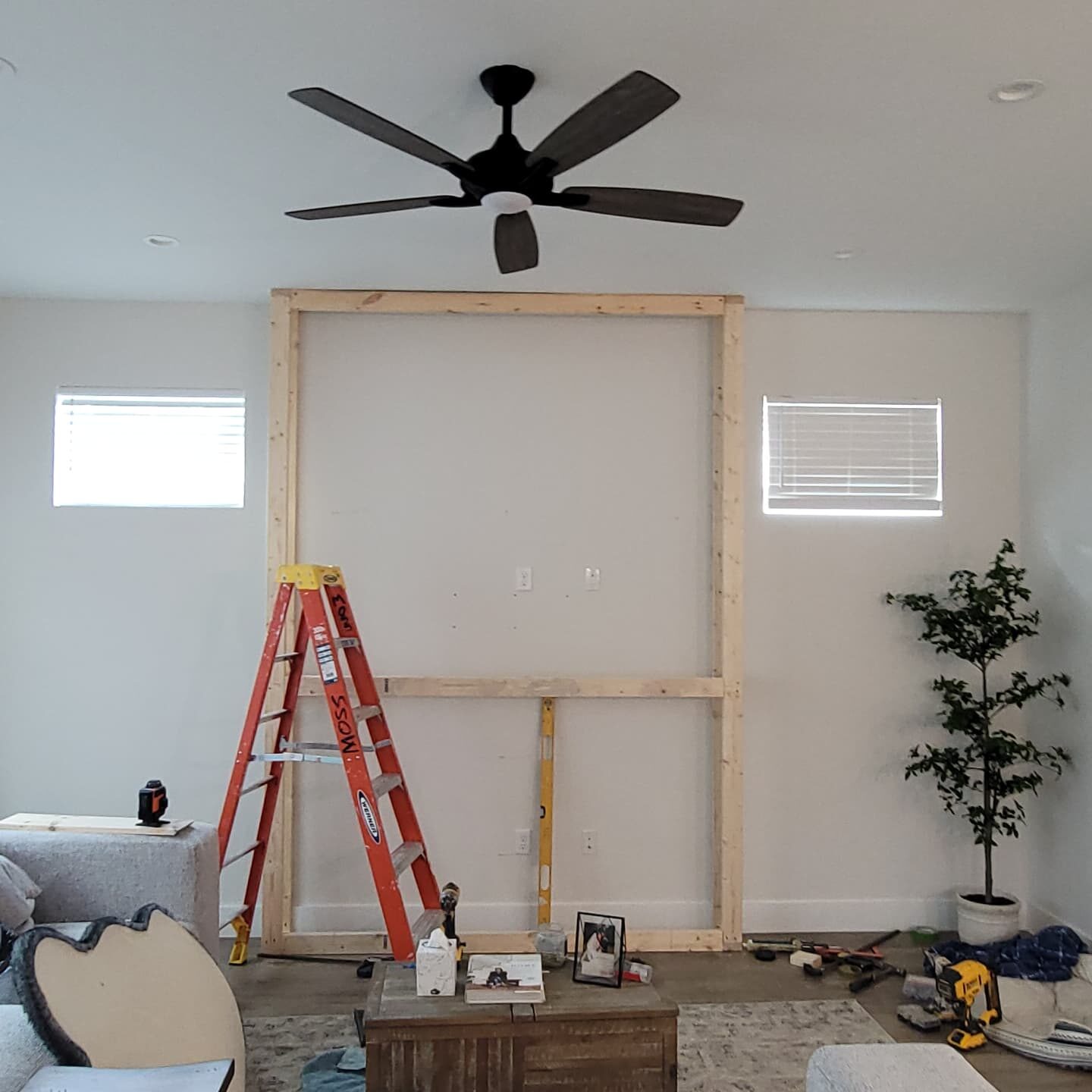 Shiplap Fireplace & TV Wall, during the work in Downtown Orlando