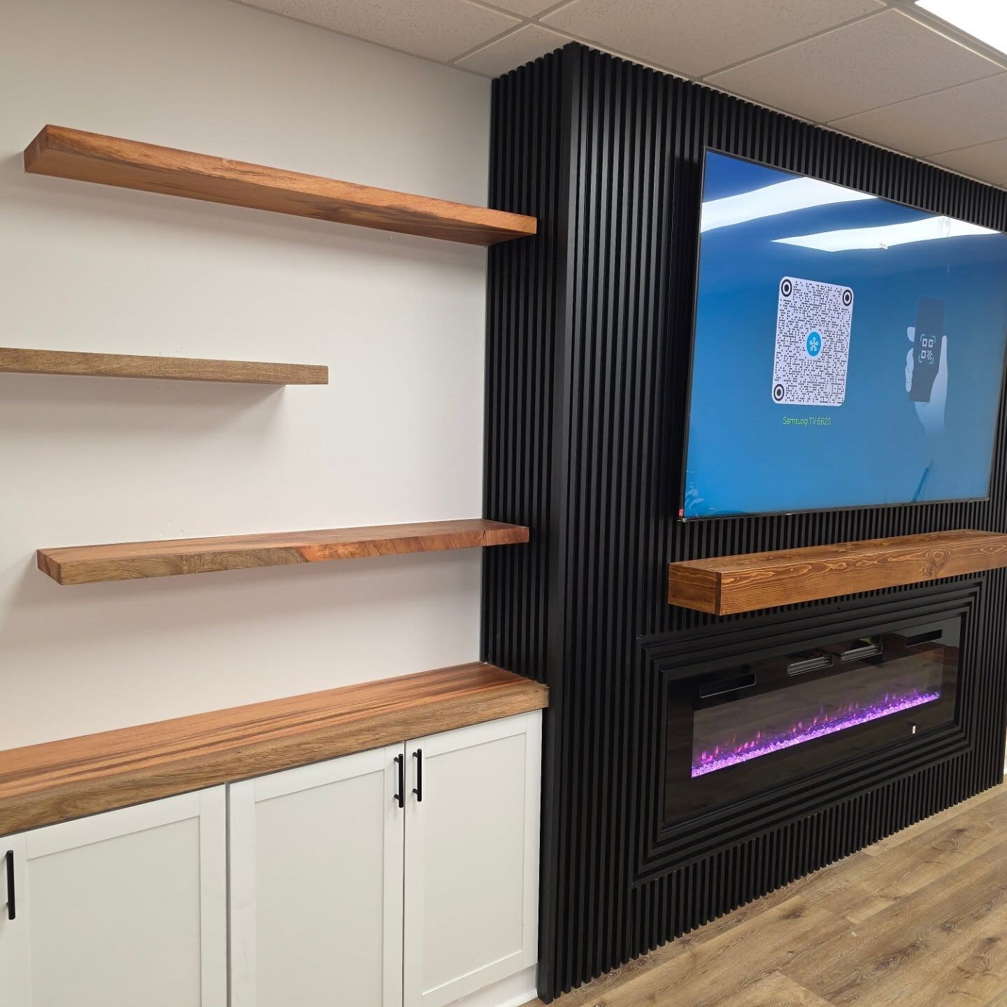 Media Wall & Floating Shelves after in Orlando: slat-panel media wall, floating shelves and trim
